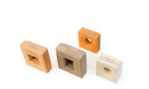 Blocos de teto, parede e queimadores para fornos / Sede de válvula e de plug para panelas